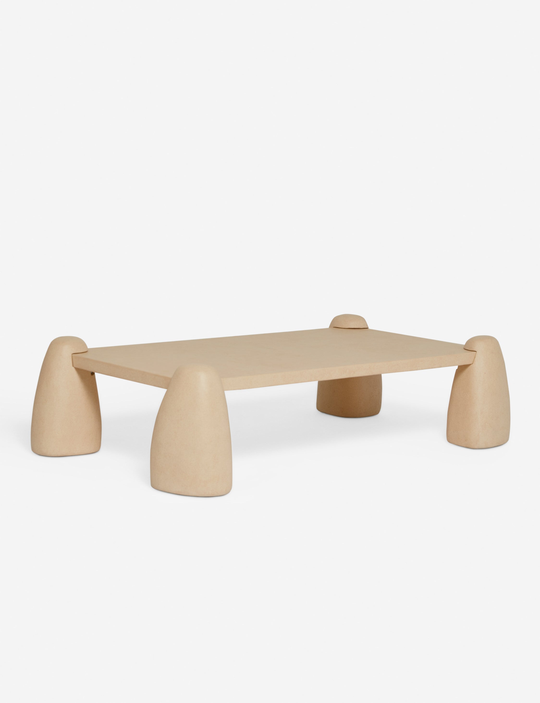 #color::sand | Angled view of the Quarry sculptural concrete coffee table